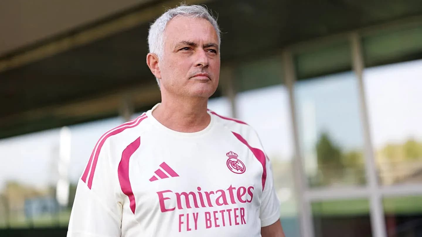 Mourinho wearing Real Madrid training kit outdoors Mourinho wearing Real Madrid training kit outdoors