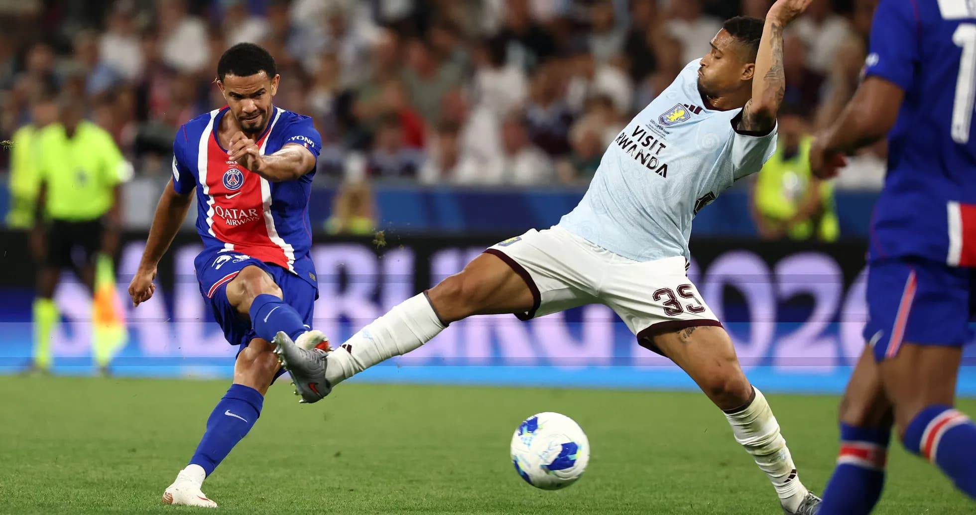 Player attempting to kick the ball during match Player attempting to kick the ball during match