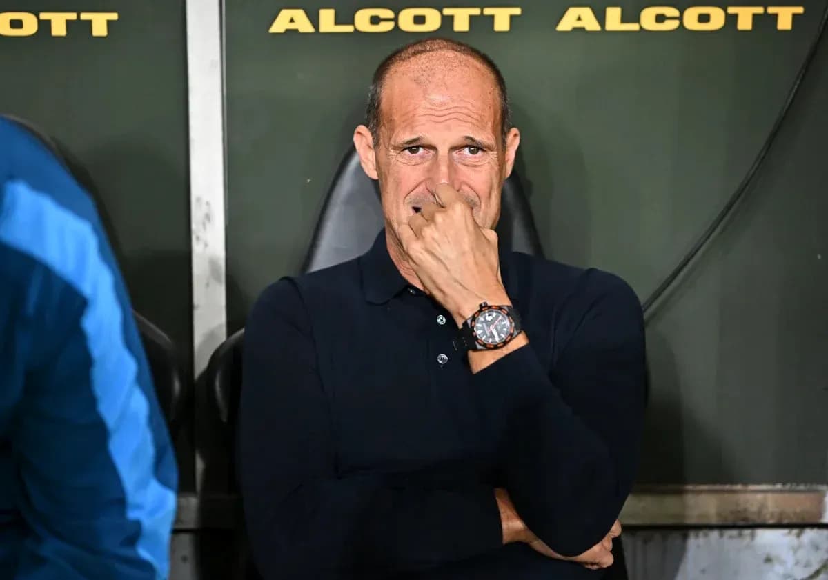 Coach sitting on the bench during a match Coach sitting on the bench during a match