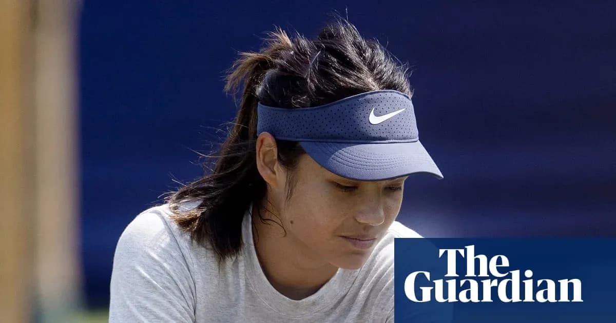 Tennis player wearing visor during practice session Tennis player wearing visor during practice session