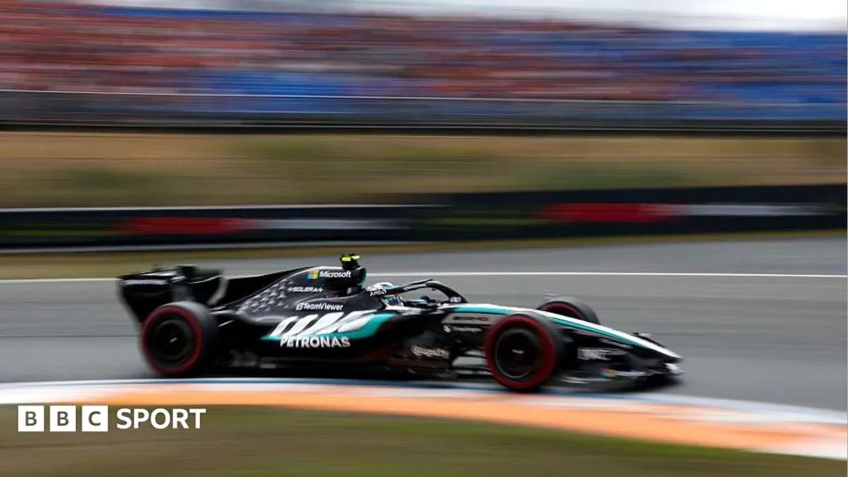 Formula 1 car speeding around the track Formula 1 car speeding around the track