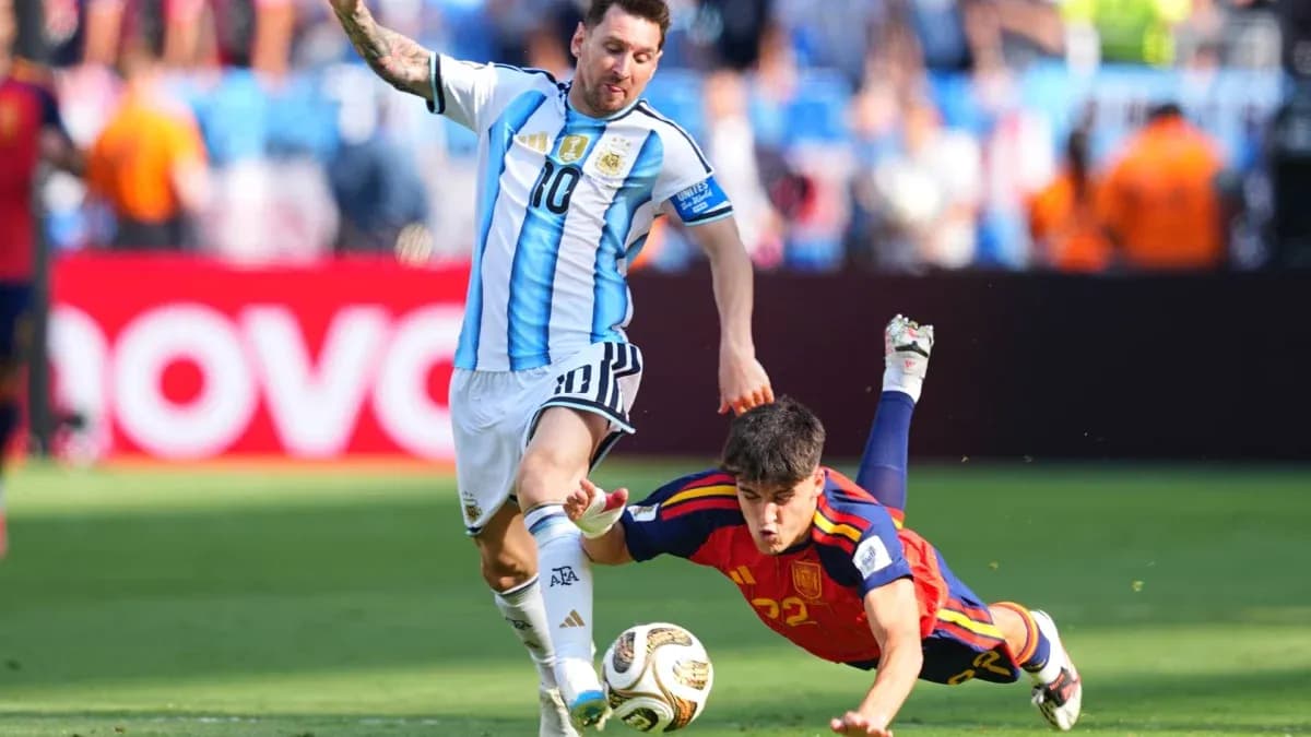 Lionel Messi evading a Spanish player on field Lionel Messi evading a Spanish player on field