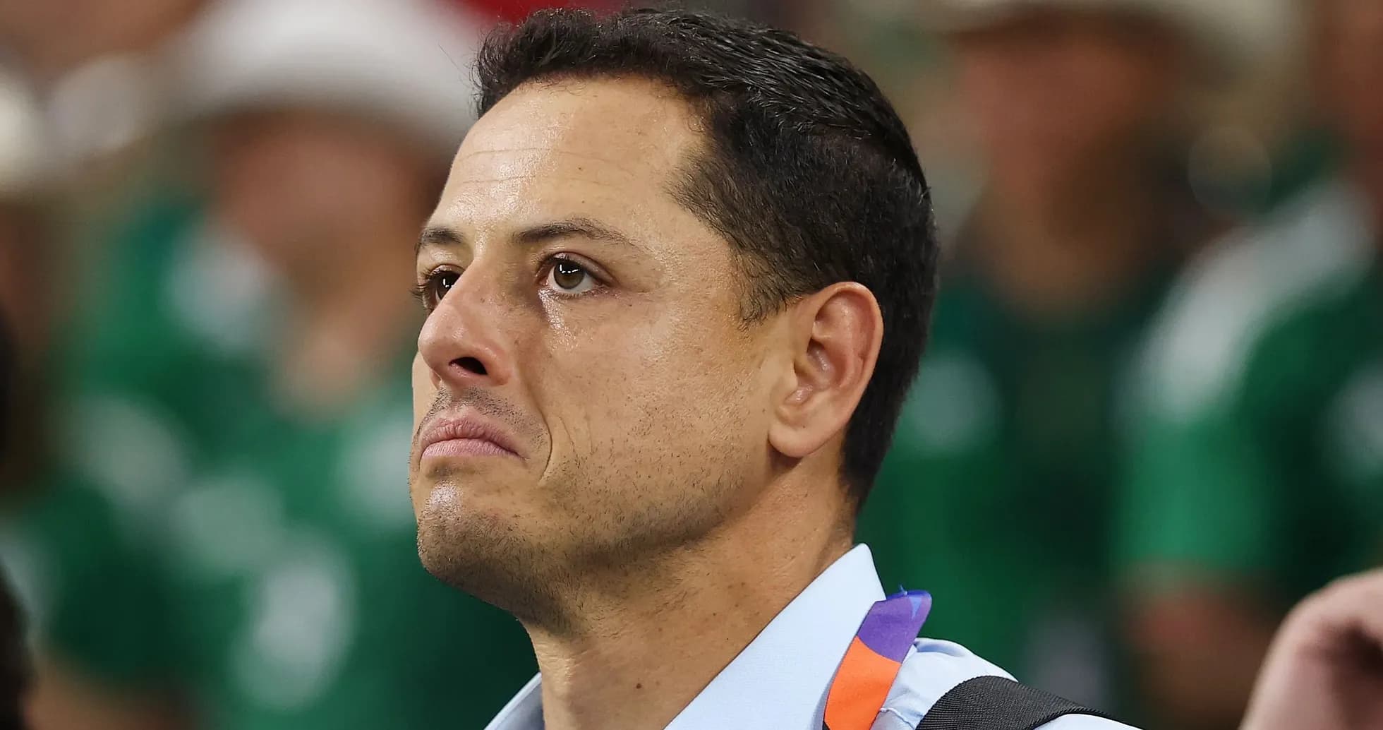 Man with tears watching an event in stadium Man with tears watching an event in stadium