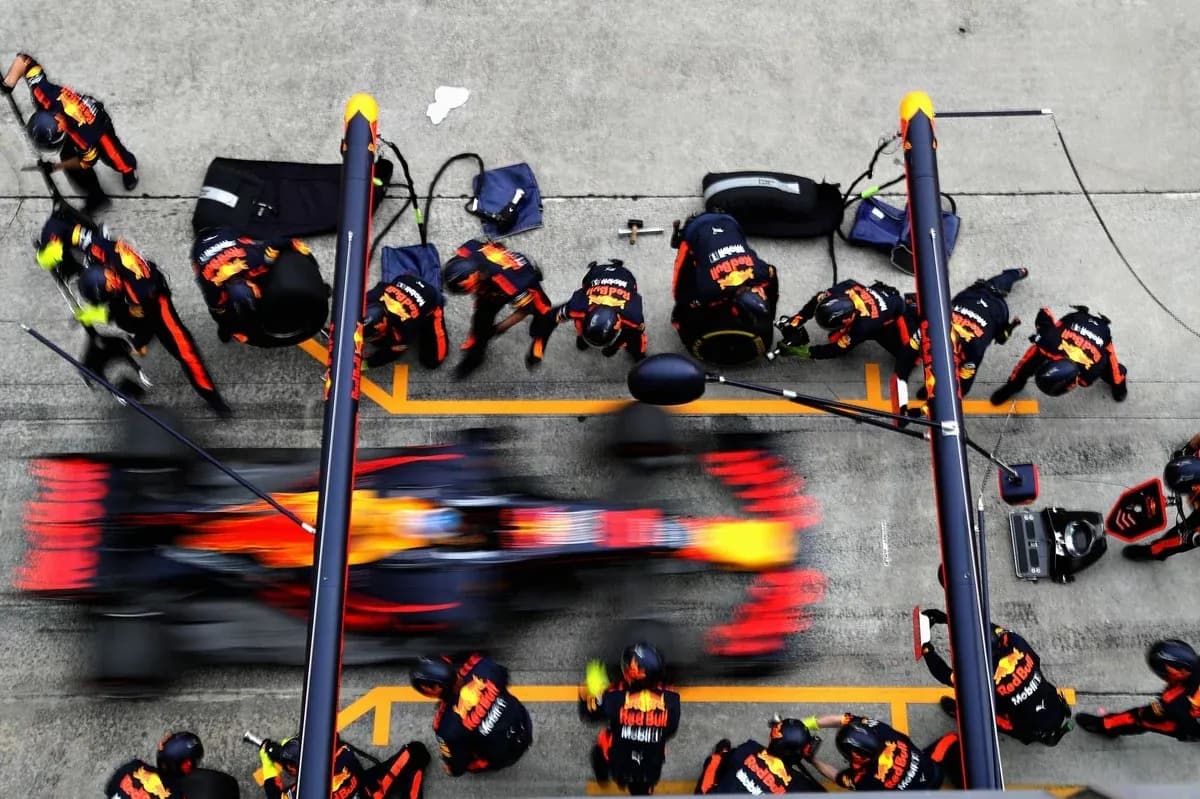 Red Bull Racing team during a pit stop Red Bull Racing team during a pit stop