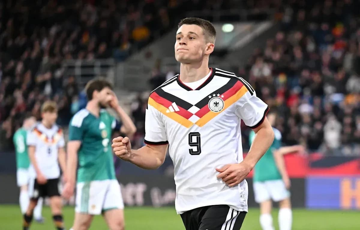 Germany player celebrating during a football match Germany player celebrating during a football match