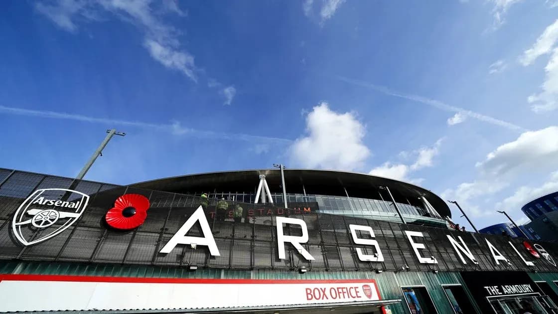 Arsenal Stadium exterior with logo and poppy Arsenal Stadium exterior with logo and poppy