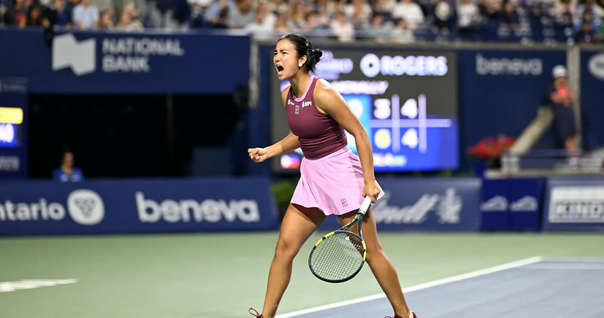 Tennis player celebrating a point during match Tennis player celebrating a point during match