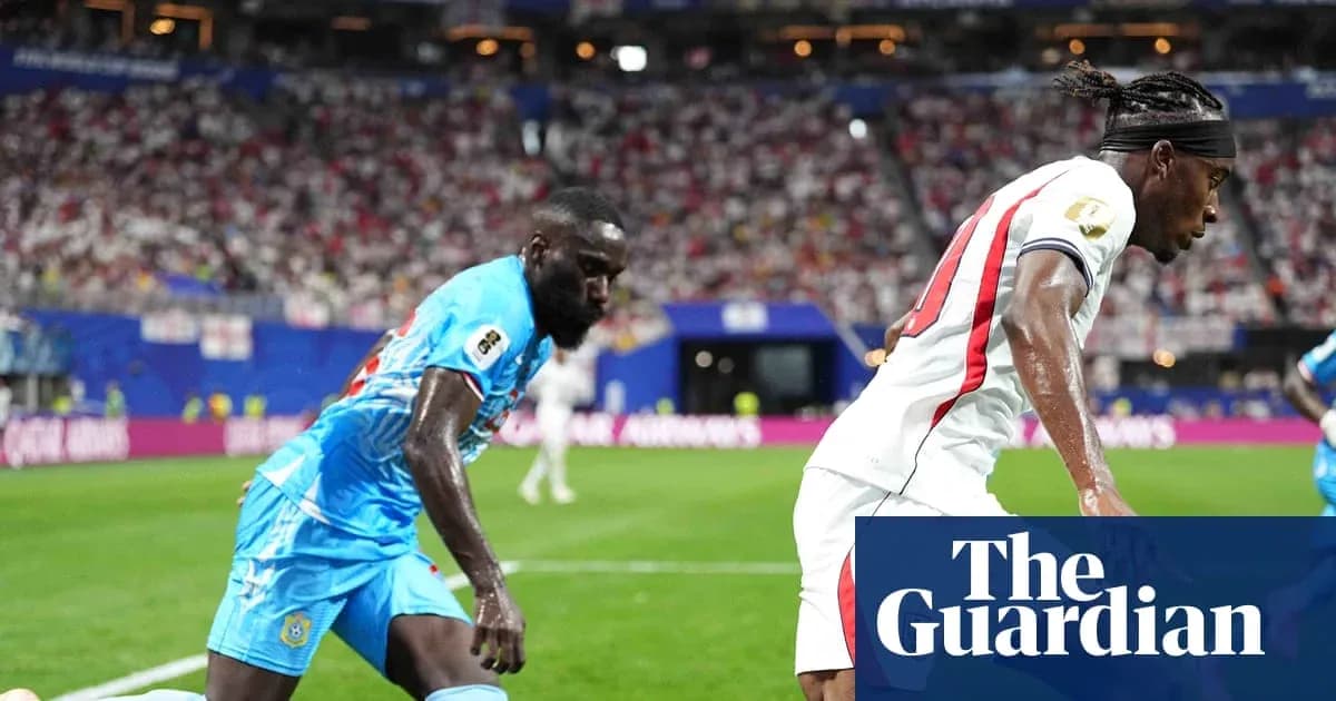 Two players contesting the ball during a match Two players contesting the ball during a match