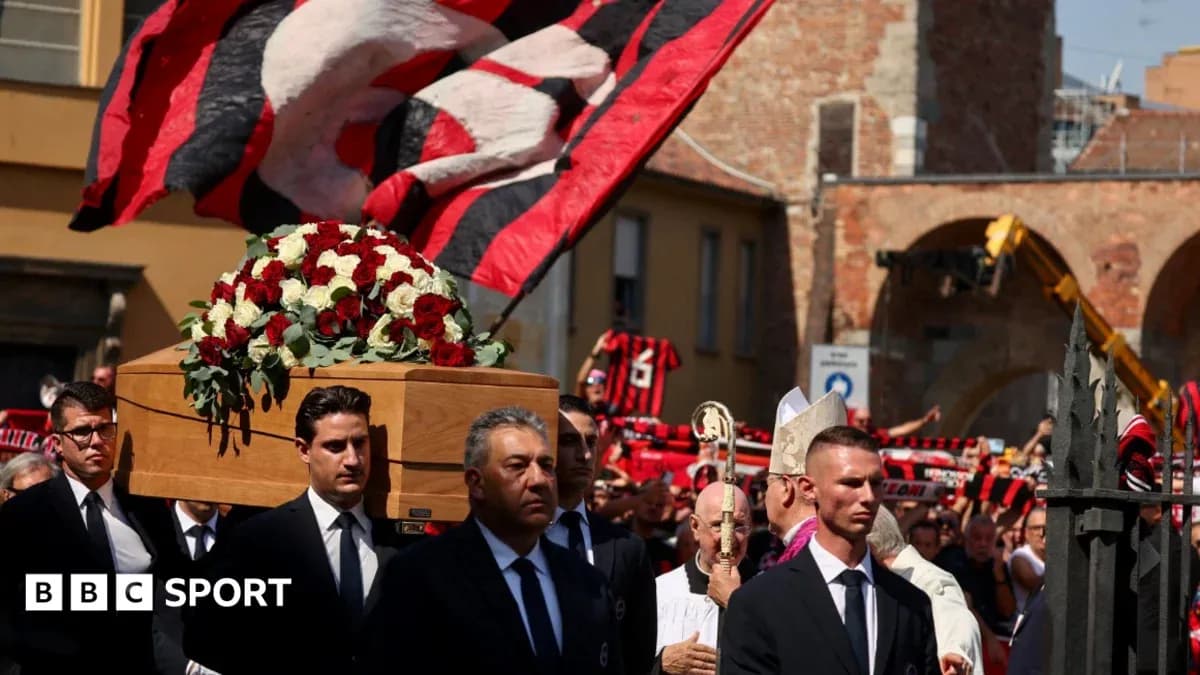 Mourners carrying a coffin during a funeral procession Mourners carrying a coffin during a funeral procession