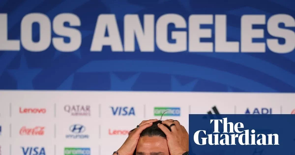 Men's football coach at press conference in Los Angeles Men's football coach at press conference in Los Angeles