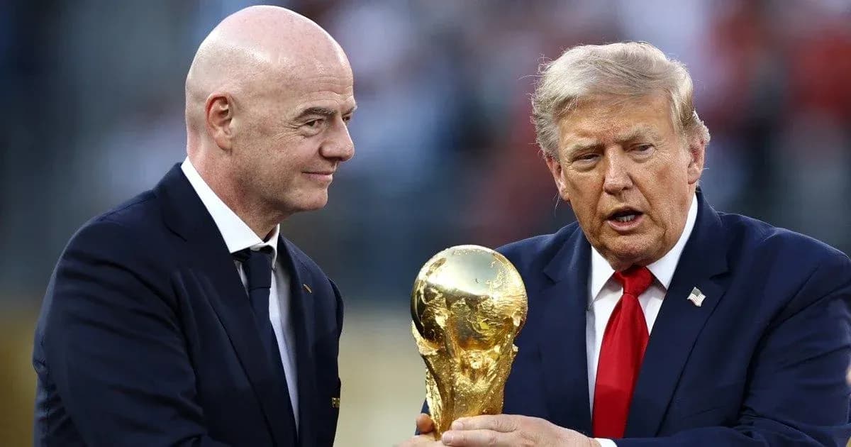 Gianni Infantino and Donald Trump with World Cup trophy Gianni Infantino and Donald Trump with World Cup trophy