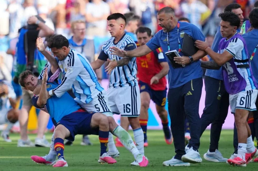 Players and staff involved in a scuffle during match Players and staff involved in a scuffle during match