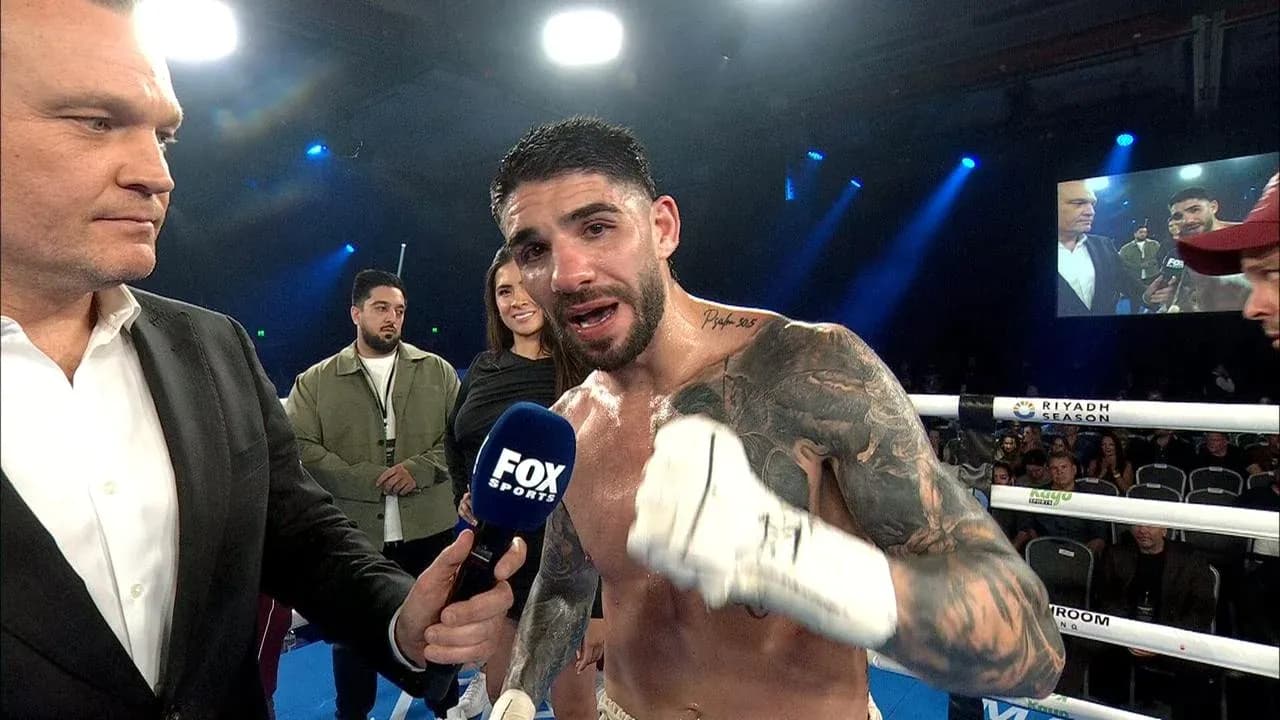 Boxer being interviewed after match in ring Boxer being interviewed after match in ring