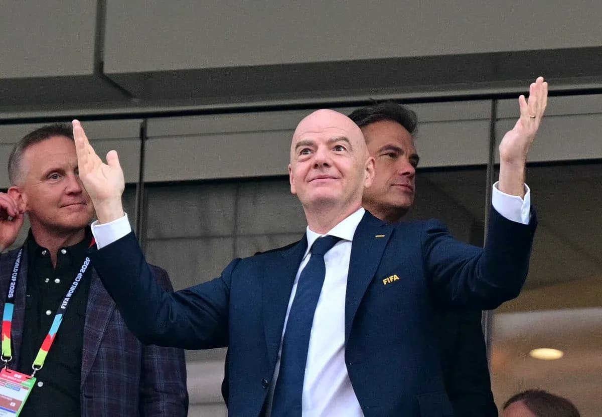 FIFA official gesturing during event from box FIFA official gesturing during event from box