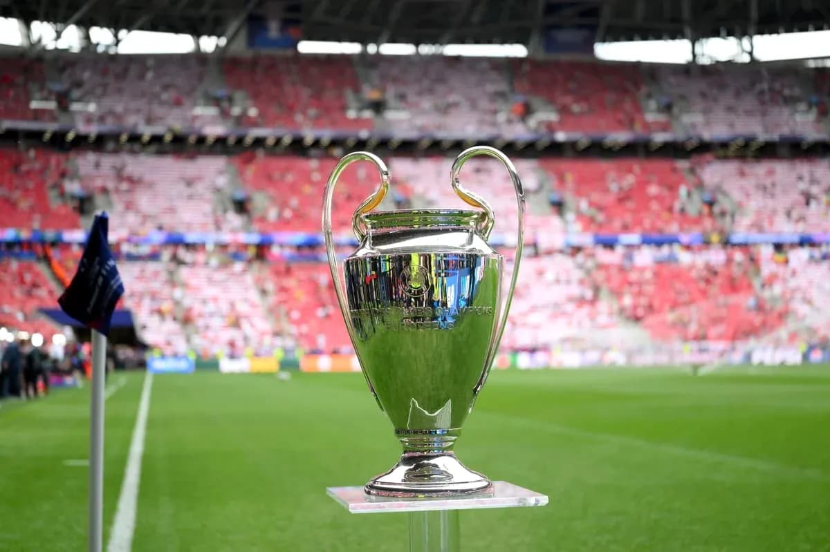 Champions League trophy on the pitch Champions League trophy on the pitch