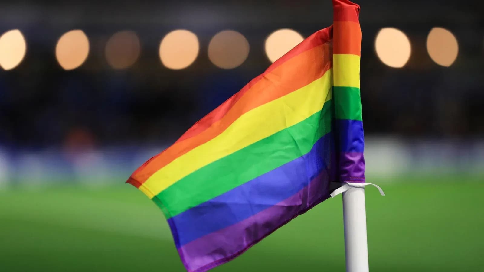 Rainbow flag at the corner of a football pitch Rainbow flag at the corner of a football pitch