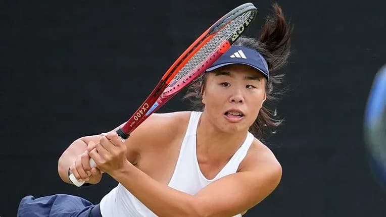 Tennis player hitting a forehand shot Tennis player hitting a forehand shot