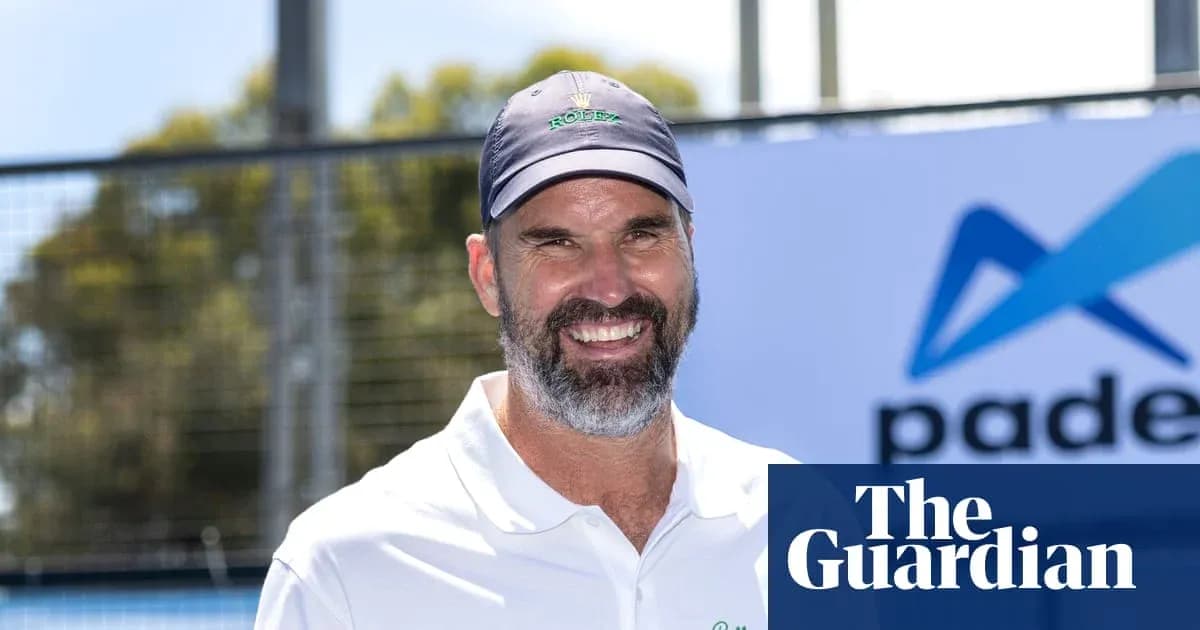 Smiling man in sports attire at padel event Smiling man in sports attire at padel event