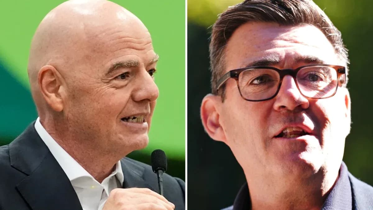 Two men speaking at a conference or event Two men speaking at a conference or event