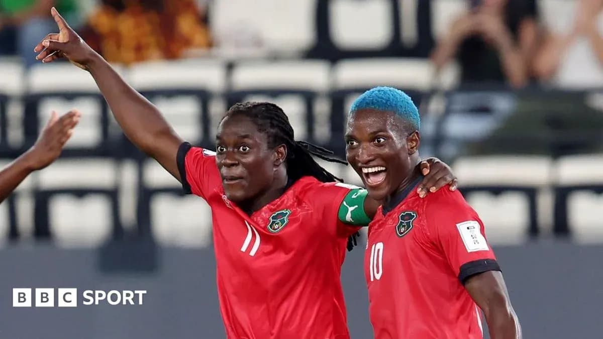 Malawi players celebrating a goal during match Malawi players celebrating a goal during match