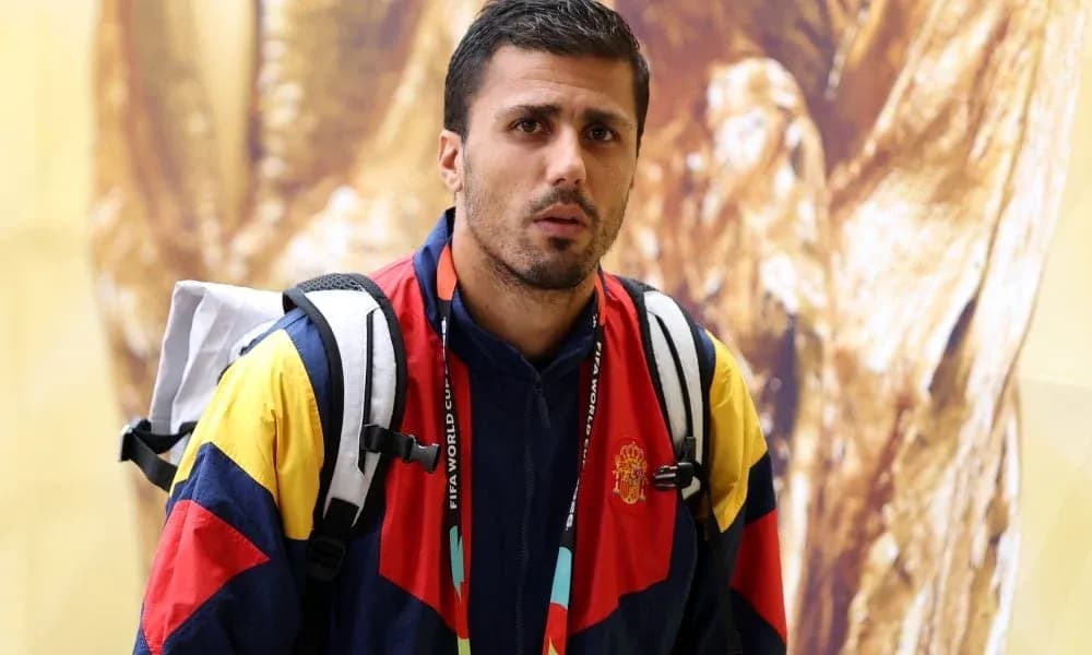Athlete in team jacket with backpack indoors Athlete in team jacket with backpack indoors