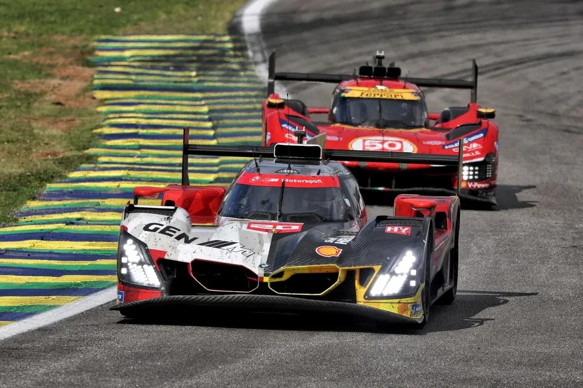 Two race cars competing on a racetrack Two race cars competing on a racetrack
