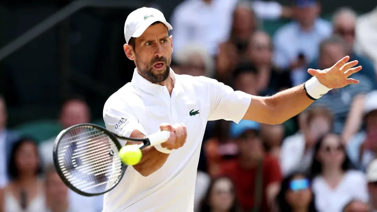 Tennis player hitting a backhand shot during match Tennis player hitting a backhand shot during match