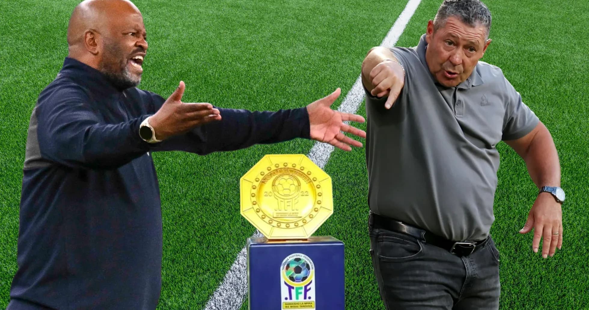 Two coaches arguing near trophy on field Two coaches arguing near trophy on field