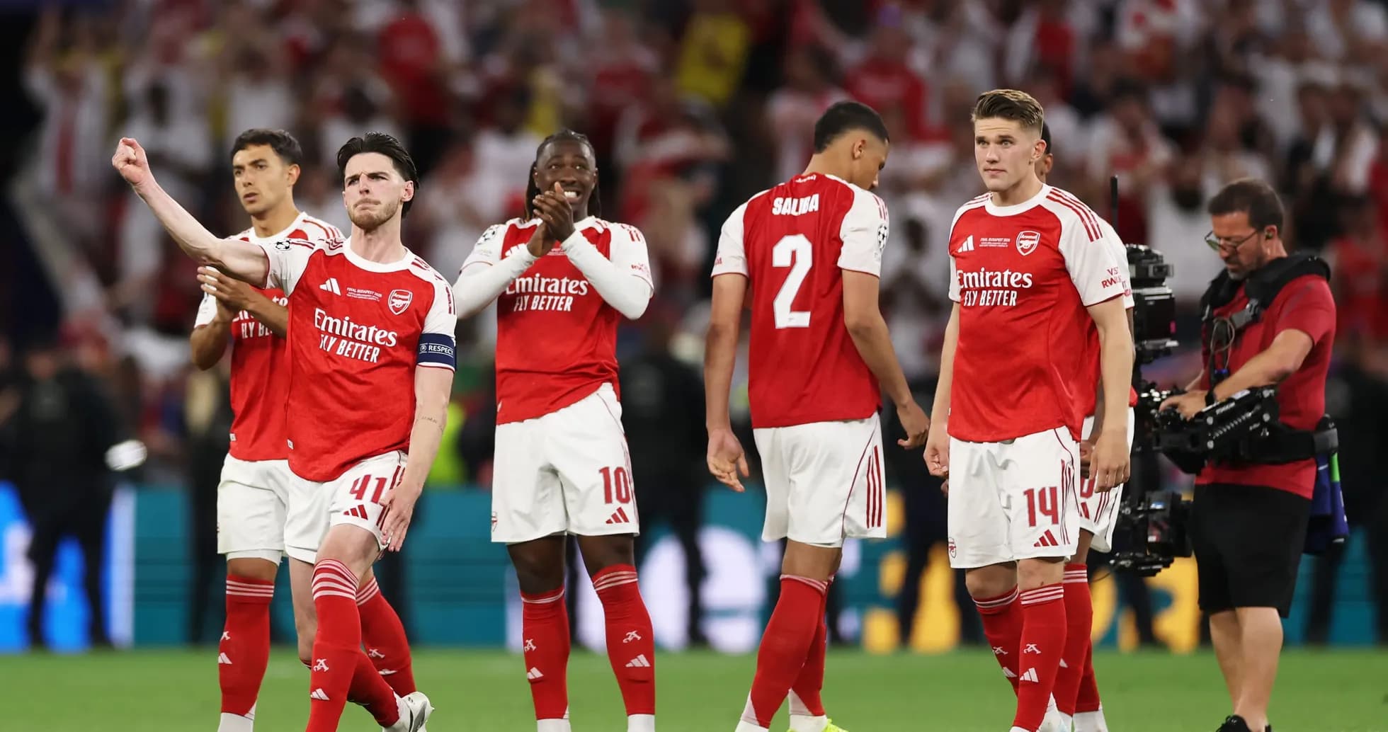 Arsenal players celebrating after a match Arsenal players celebrating after a match