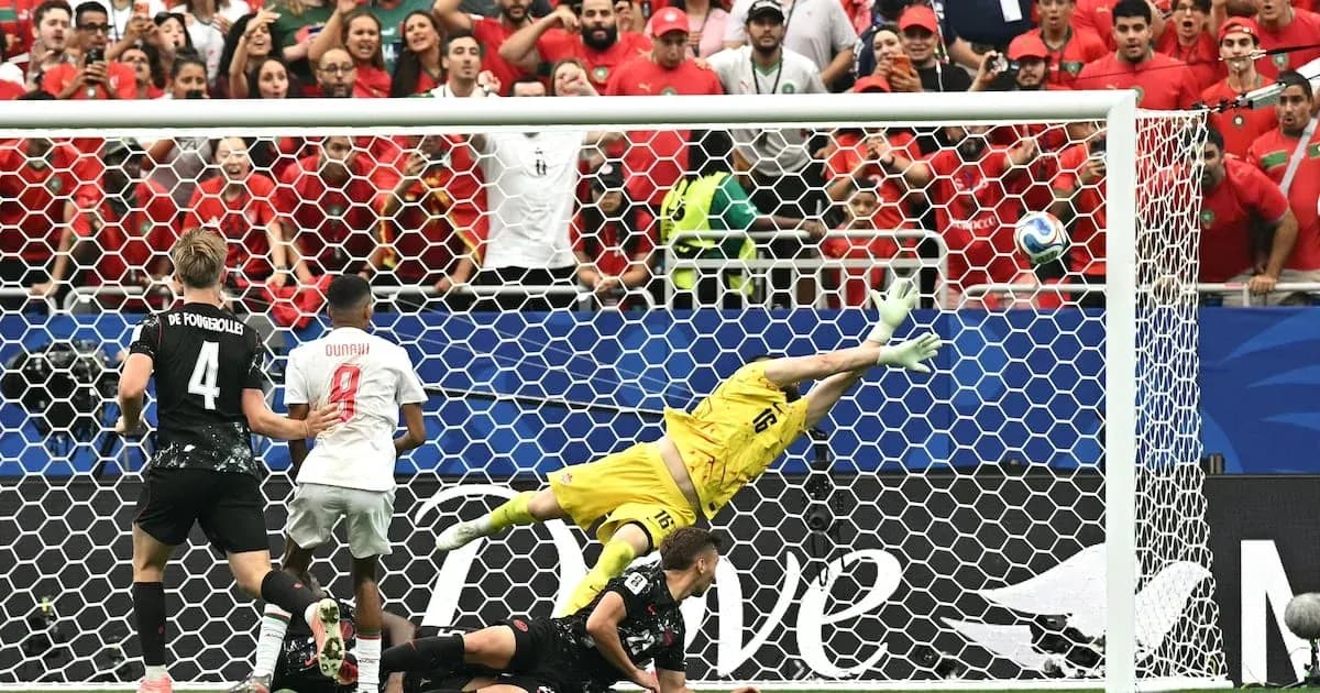 Goalkeeper diving to save a penalty kick Goalkeeper diving to save a penalty kick