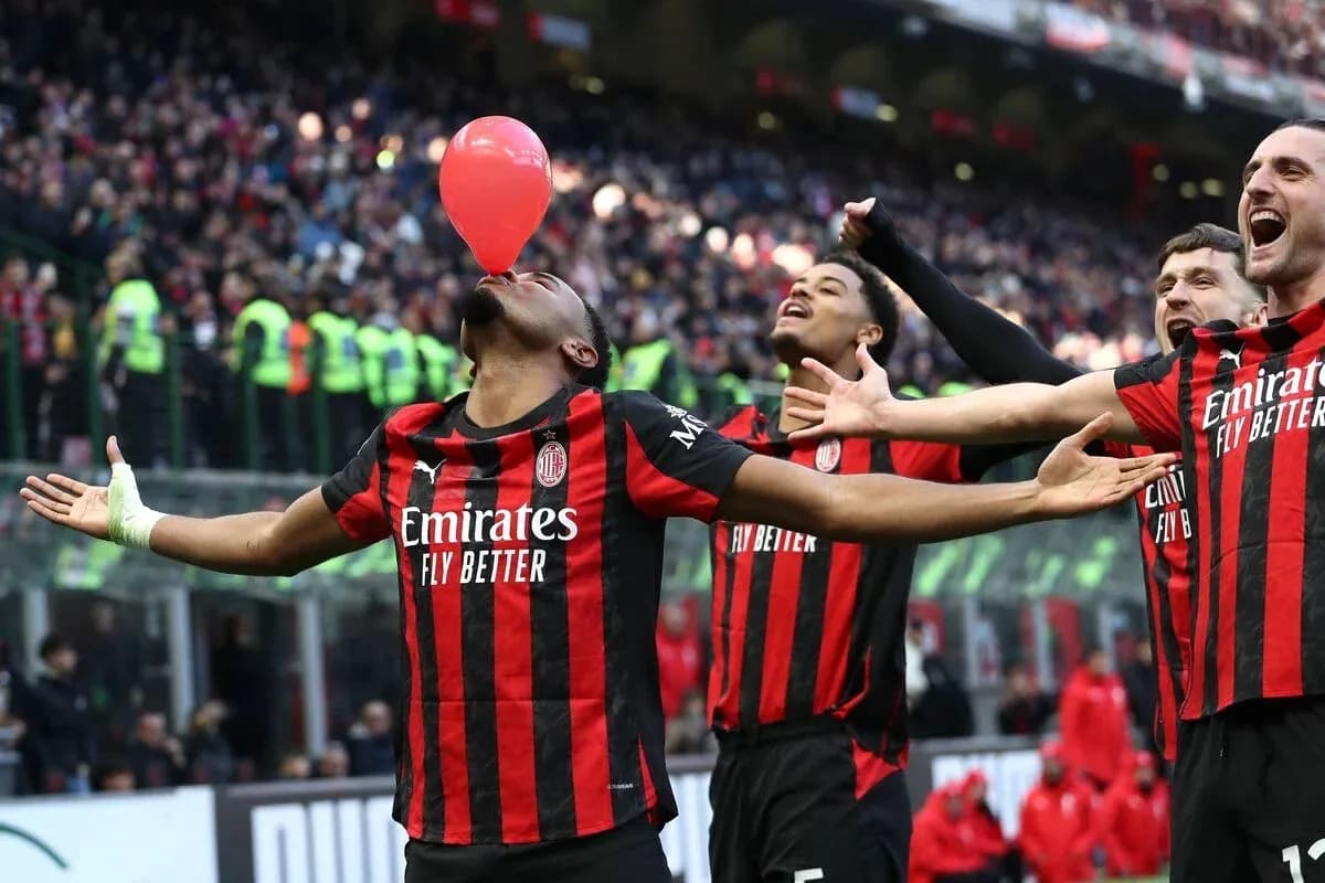 AC Milan players celebrating with balloon during match AC Milan players celebrating with balloon during match