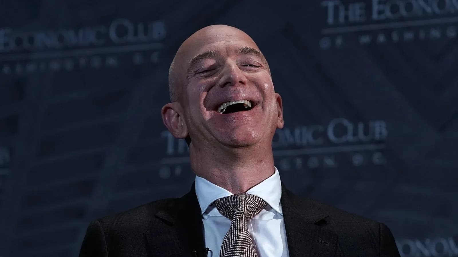 Man laughing at The Economic Club event Man laughing at The Economic Club event