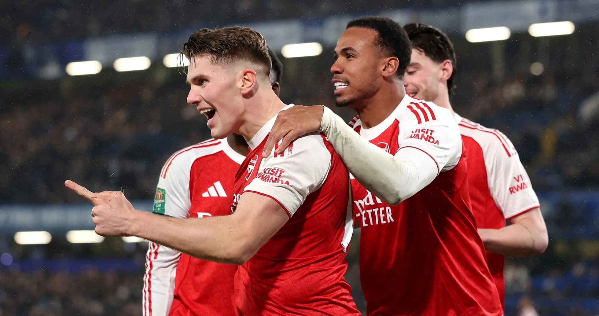 Arsenal players celebrating a goal together Arsenal players celebrating a goal together