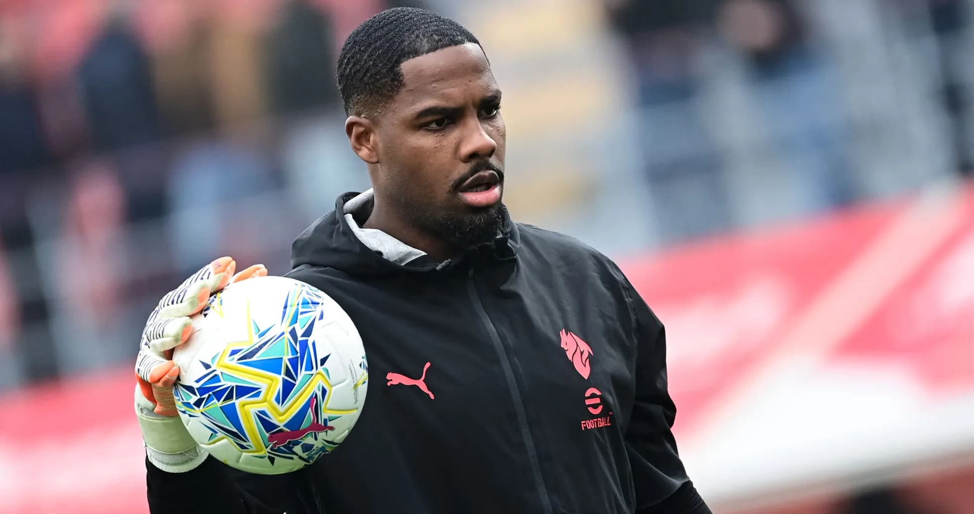 Porter holding a football before the match Porter holding a football before the match