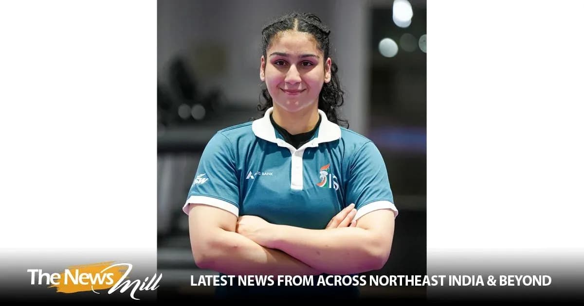 Athlete posing with arms crossed, wearing sports uniform Athlete posing with arms crossed, wearing sports uniform