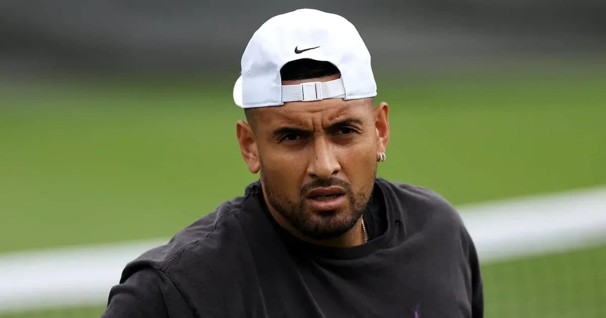 Tennis player wearing cap during practice session Tennis player wearing cap during practice session
