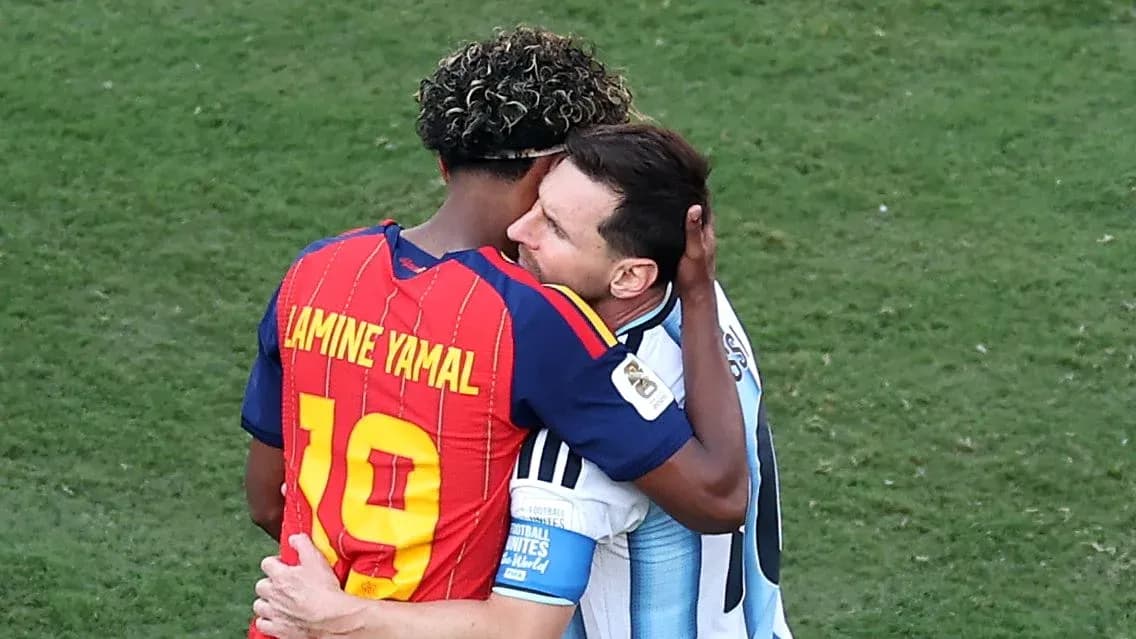 Two players embracing on the football field Two players embracing on the football field