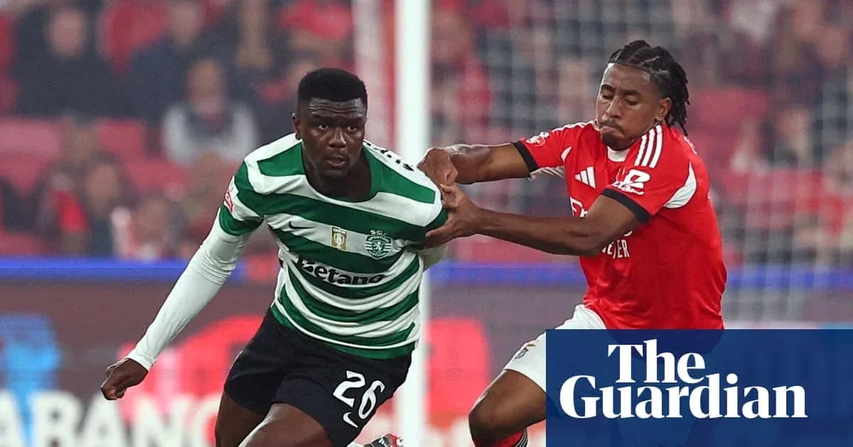 Benfica and Sporting players contesting the ball Benfica and Sporting players contesting the ball
