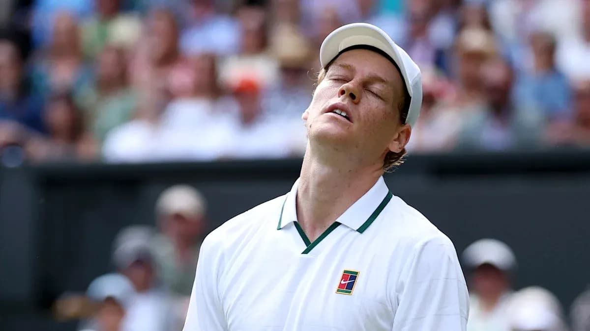 Tennis player reacting during a match at Wimbledon Tennis player reacting during a match at Wimbledon