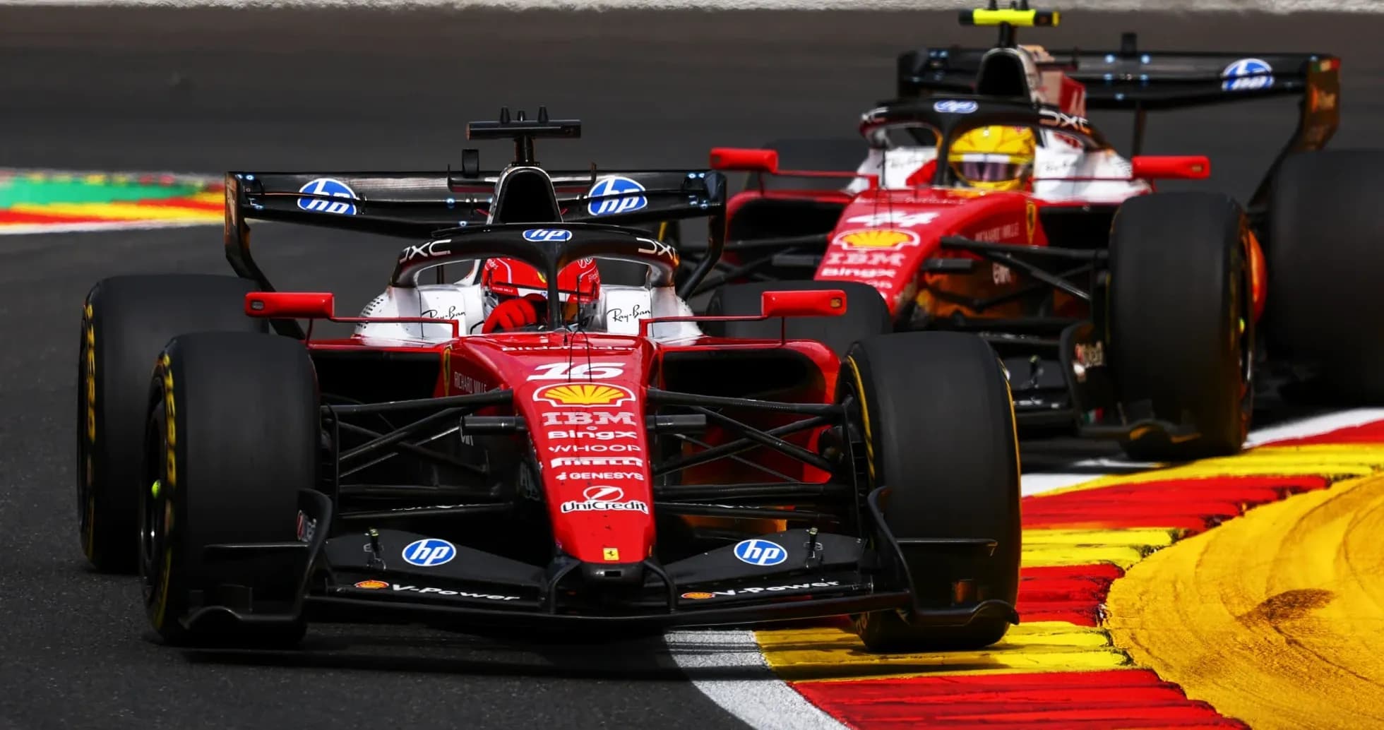 Ferrari cars racing on track during Formula 1 event Ferrari cars racing on track during Formula 1 event