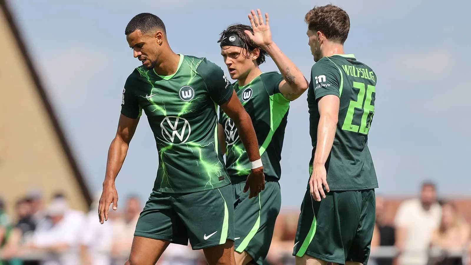 Wolfsburg players during match celebrating a goal Wolfsburg players during match celebrating a goal