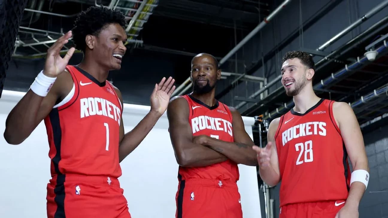 Three Houston Rockets players posing for photo Three Houston Rockets players posing for photo