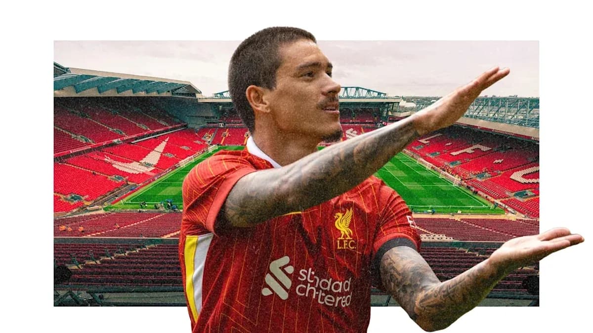 Futbolchi Anfield stadionida joylashgan Futbolchi Anfield stadionida joylashgan
