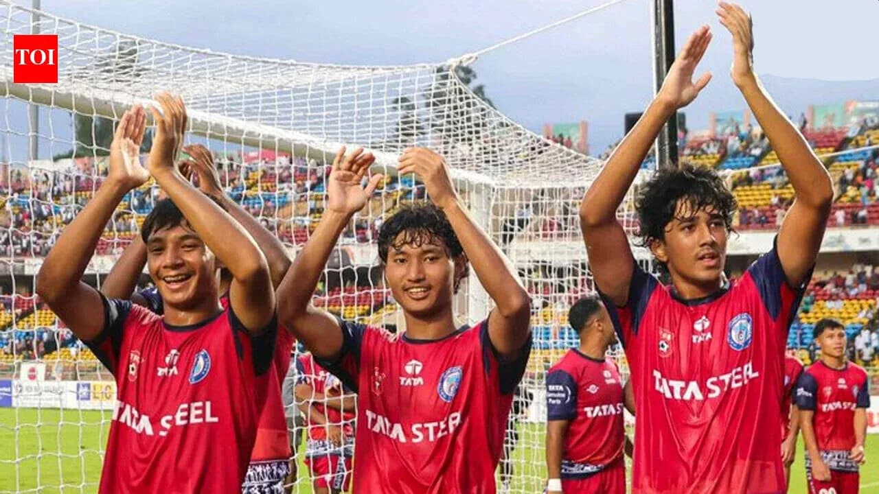 U19 players celebrating in front of fans U19 players celebrating in front of fans