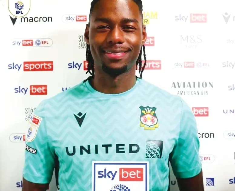 Goalkeeper posing in club kit with sponsor logos Goalkeeper posing in club kit with sponsor logos