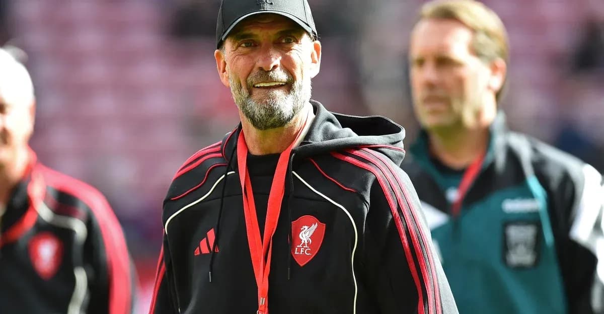 Liverpool manager on pitch before a match Liverpool manager on pitch before a match