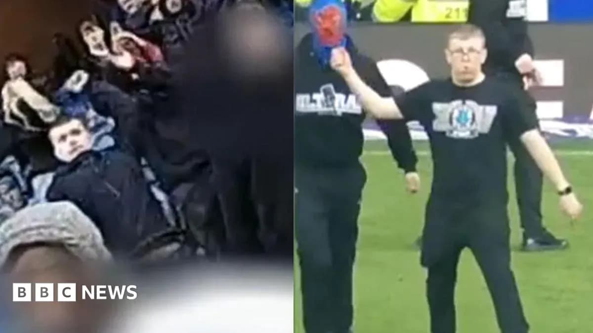 Fans celebrating in stands during football match Fans celebrating in stands during football match
