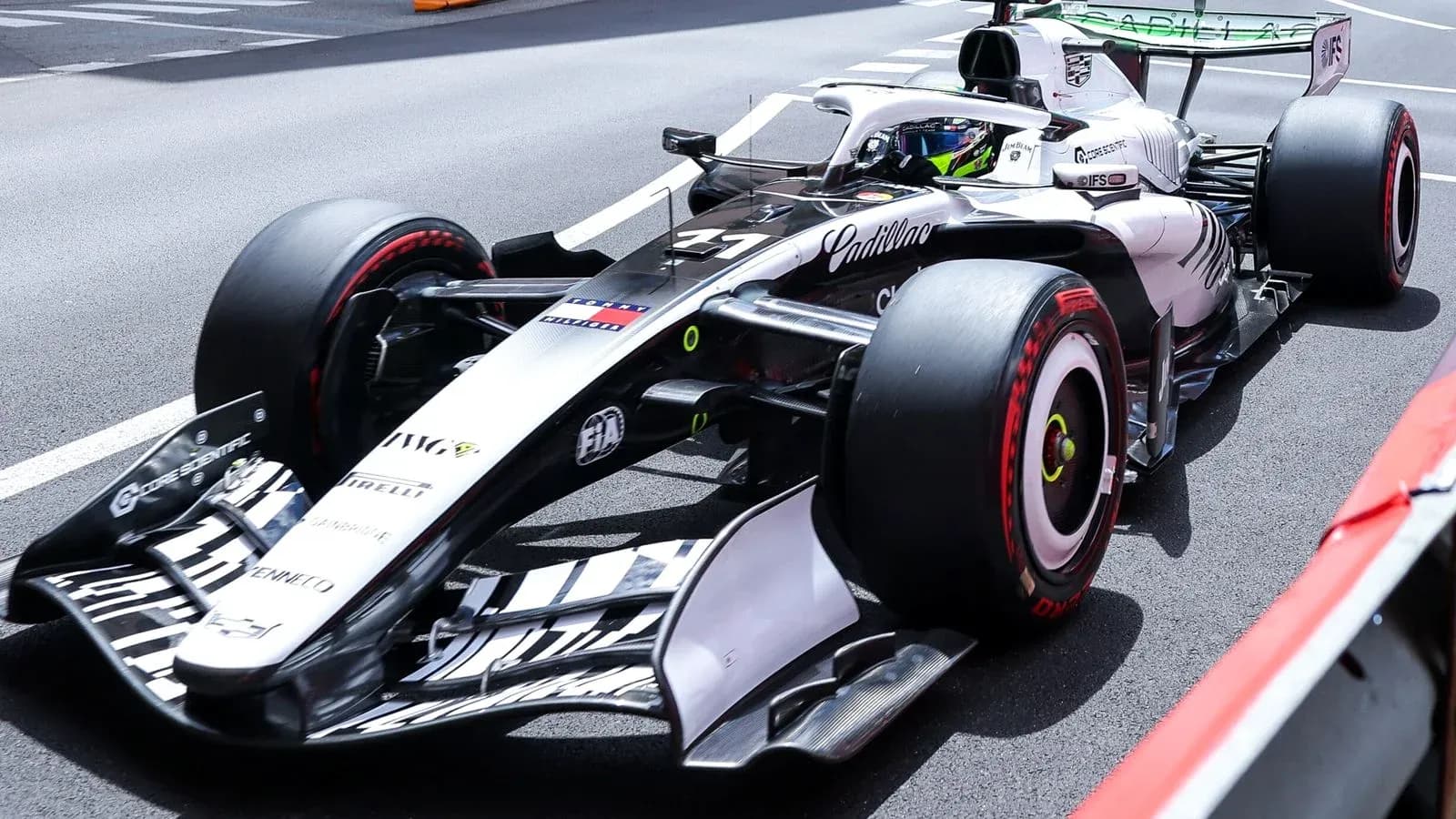 Formula 1 car driving on the track Formula 1 car driving on the track