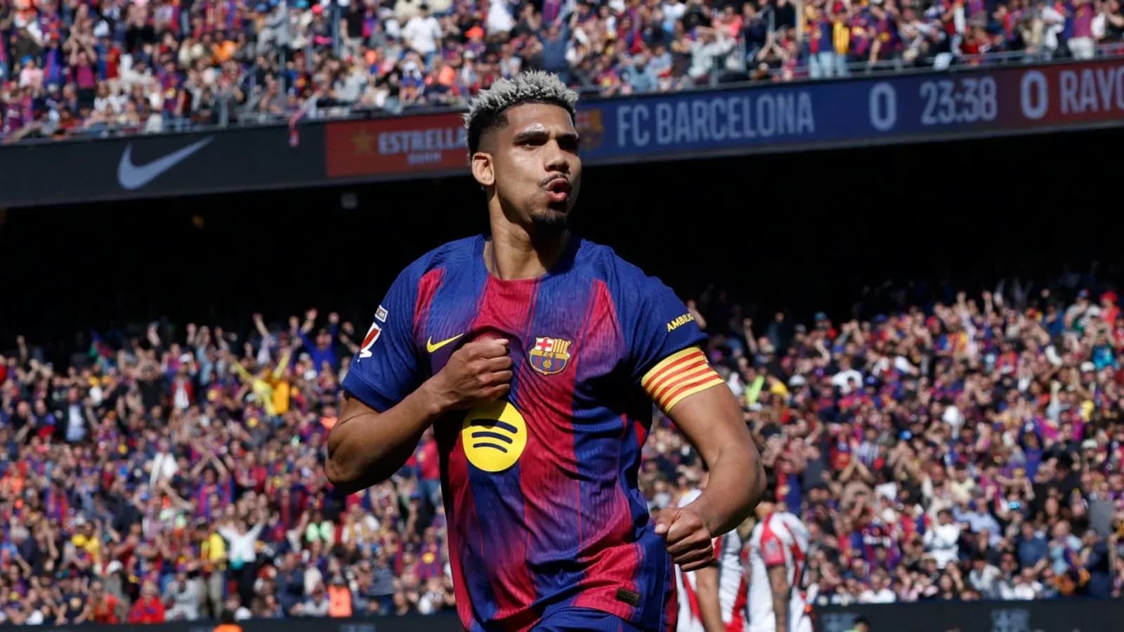 Barcelona player celebrating goal in front of fans Barcelona player celebrating goal in front of fans