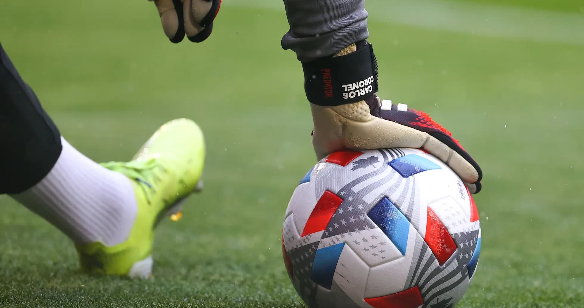 Goalkeeper placing ball on the ground Goalkeeper placing ball on the ground